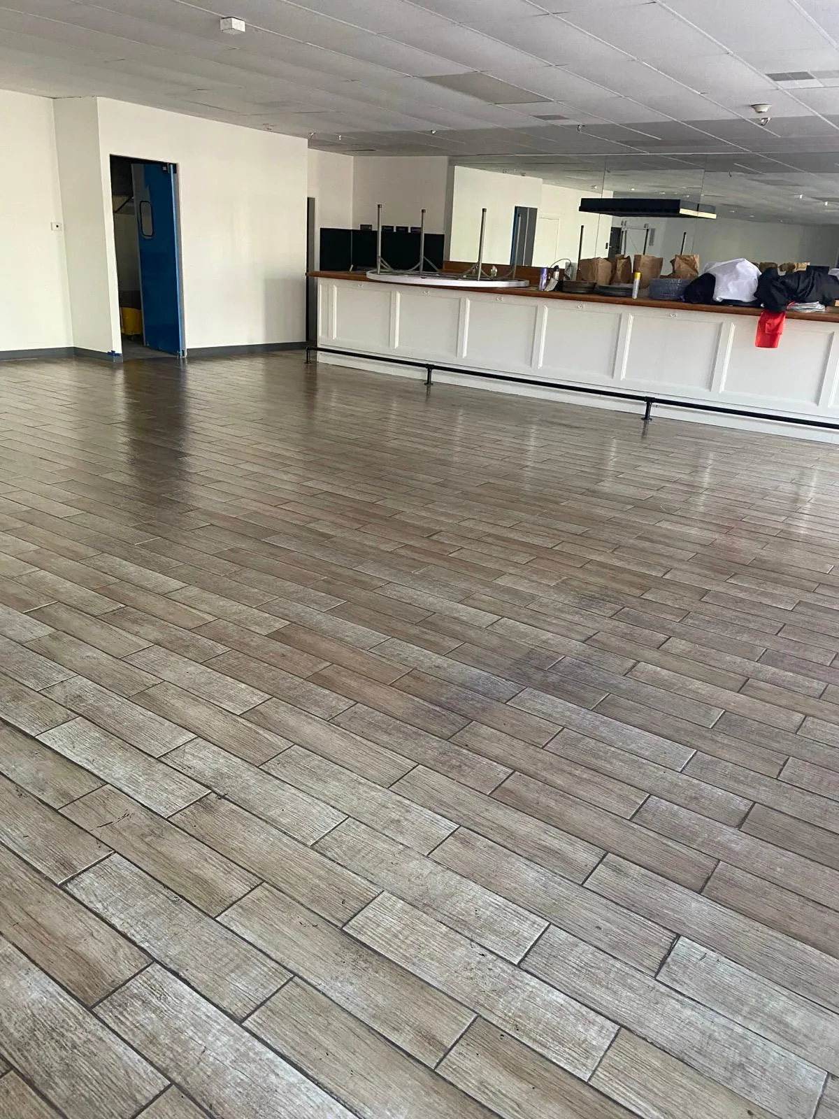 Open office floor with plank-look flooring ready for the workday